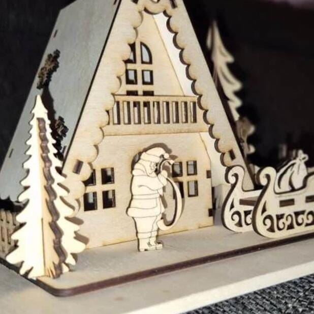 Customer photo review of Christmas house Santa sleigh scene laser cut svg file