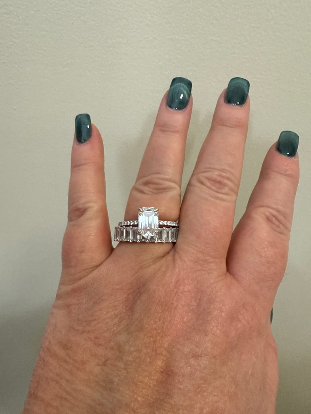 Customer photo review of Louily Eternity 5 Ct Emerald Cut Women's Wedding Band In Sterling Silver