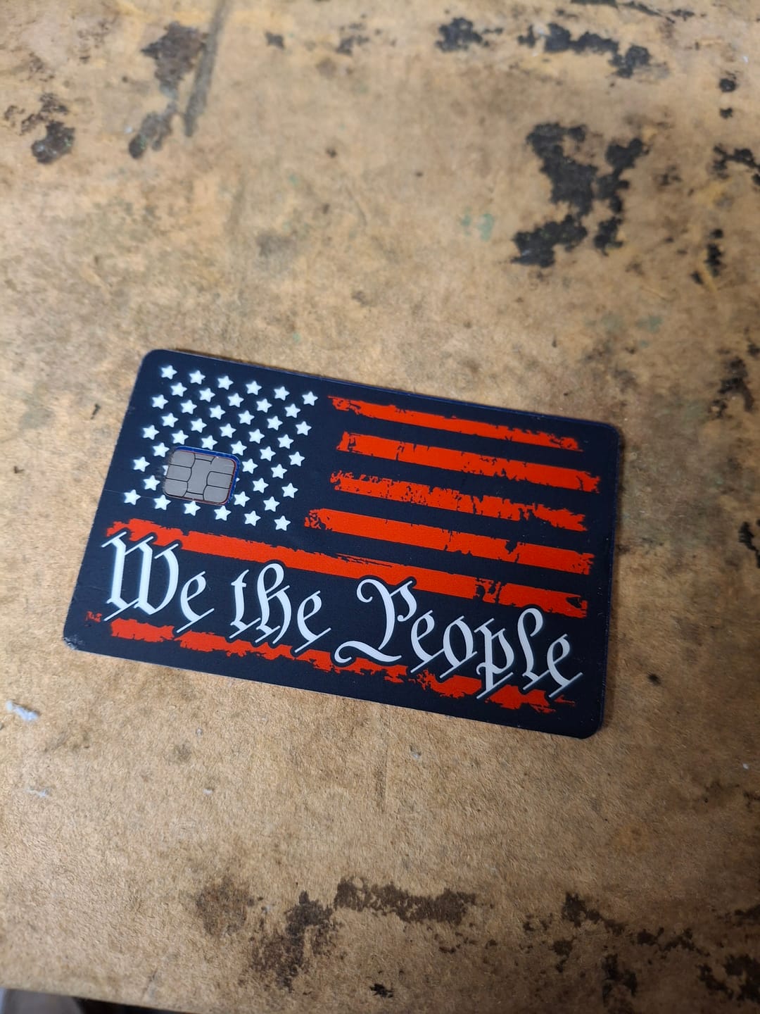 Customer photo review of We The People Flag Credit Card Skin Decal