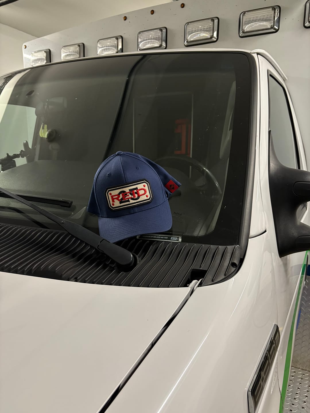 Customer photo review of FLEXFIT HOSE HAT WITH CUSTOM BACK OF HAT