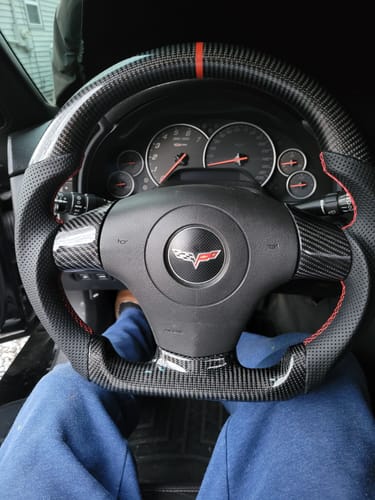 Customer photo review of Genuine Carbon Fiber Steering Wheel With Button Trim For C6 Corvette 2006-2011