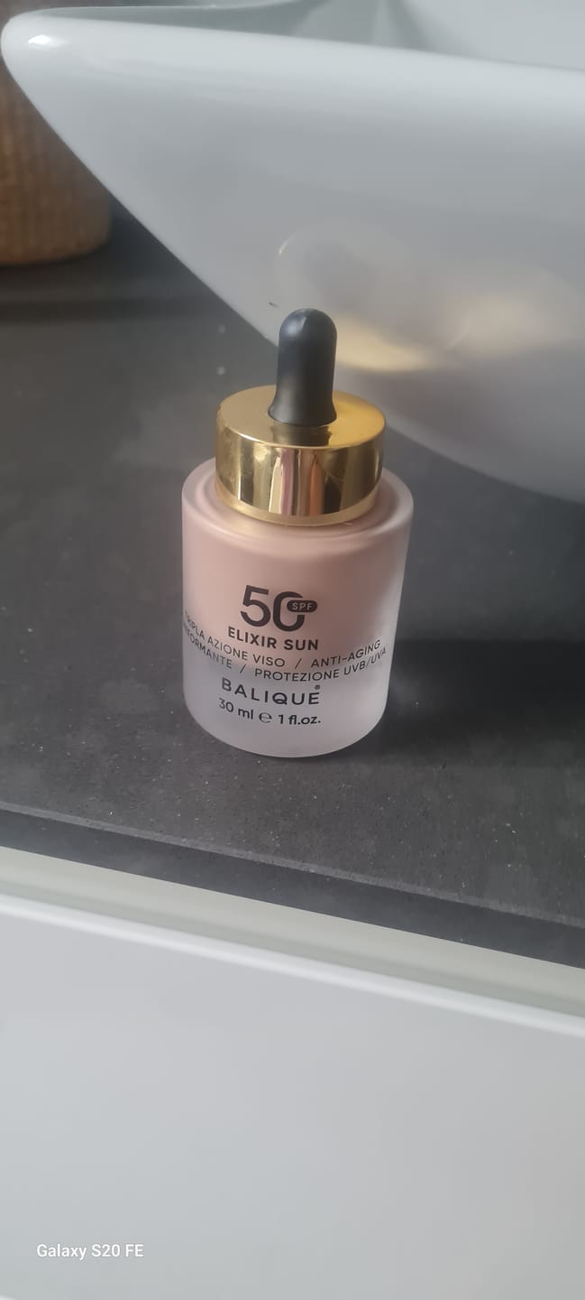 Customer photo review of ELIXIR SUN SPF50 - Siero Viso tripla azione