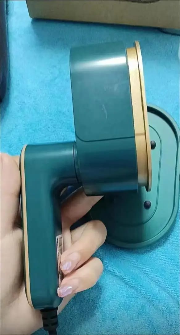 Customer photo review of Compact Travel Steam Iron Portable Garment Steamer for Quick Presses — Green with Gold-Tone | KIMLUD