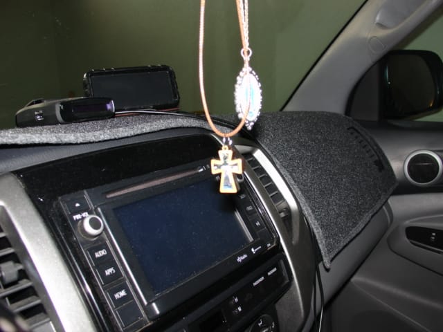 Customer photo review of Holy Land Olive Wood Mother of Pearl Cross Pendant