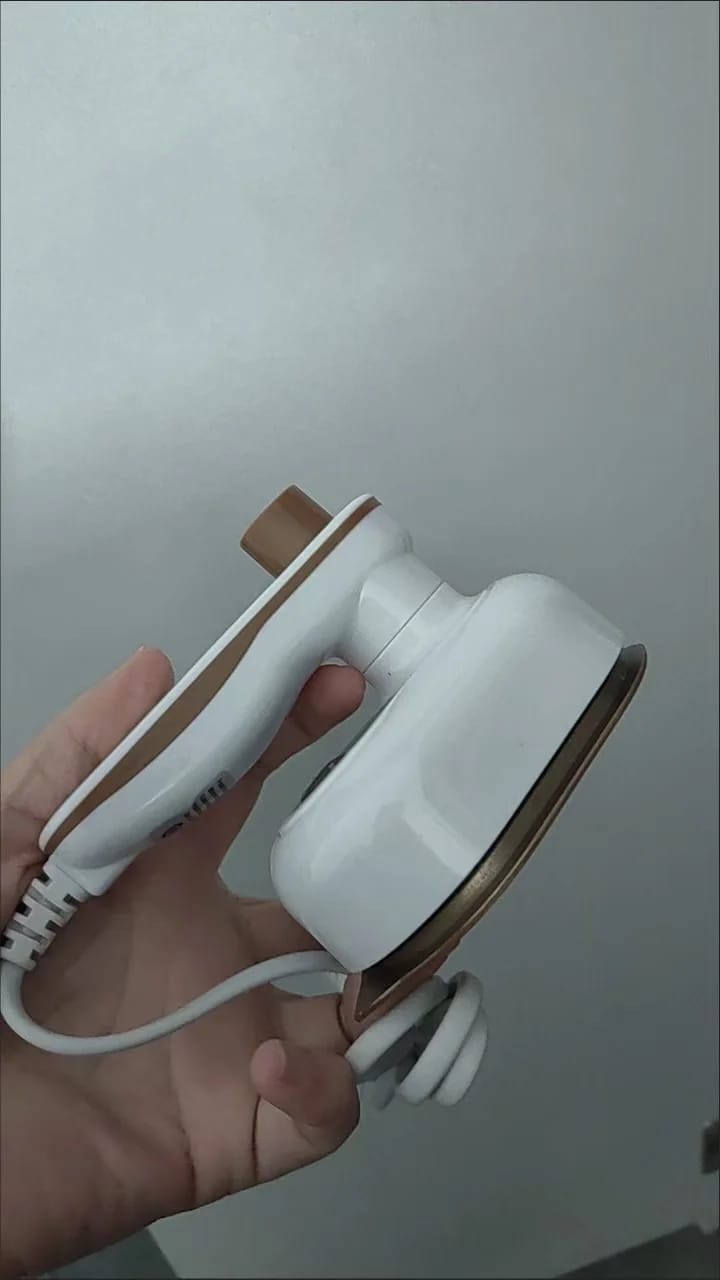 Customer photo review of Compact Travel Steam Iron Portable Garment Steamer for Quick Presses — Green with Gold-Tone | KIMLUD
