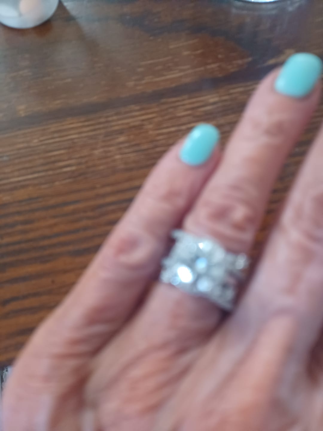 Customer photo review of Halo Moissanite With Enhancer Cross Shank Bridal Engagement Ring Set