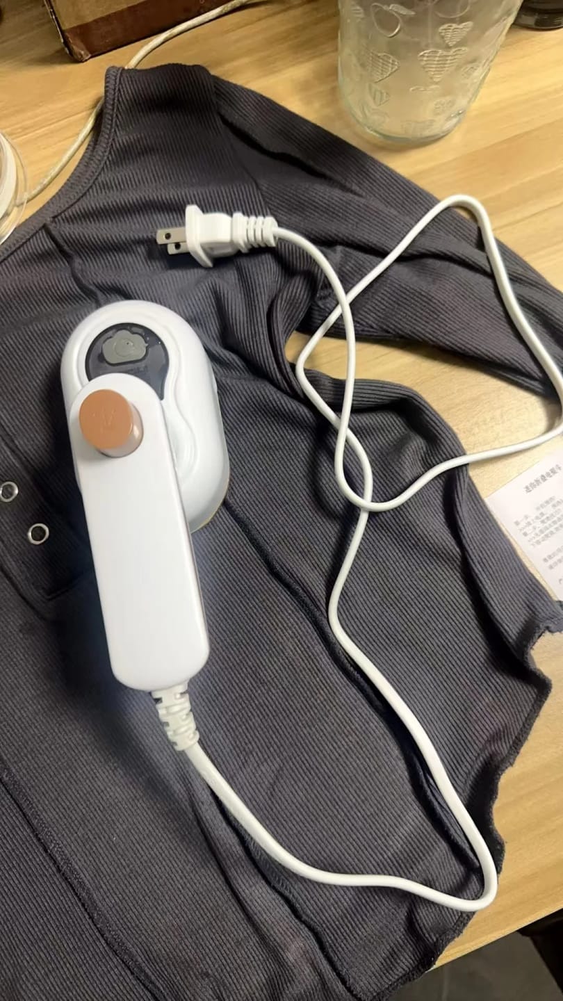 Customer photo review of Compact Travel Steam Iron Portable Garment Steamer for Quick Presses — Green with Gold-Tone | KIMLUD