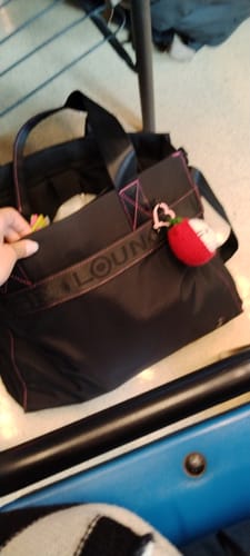 Reseña con foto de un cliente sobre Cartera De Hombro Notebook Nylon Llavero