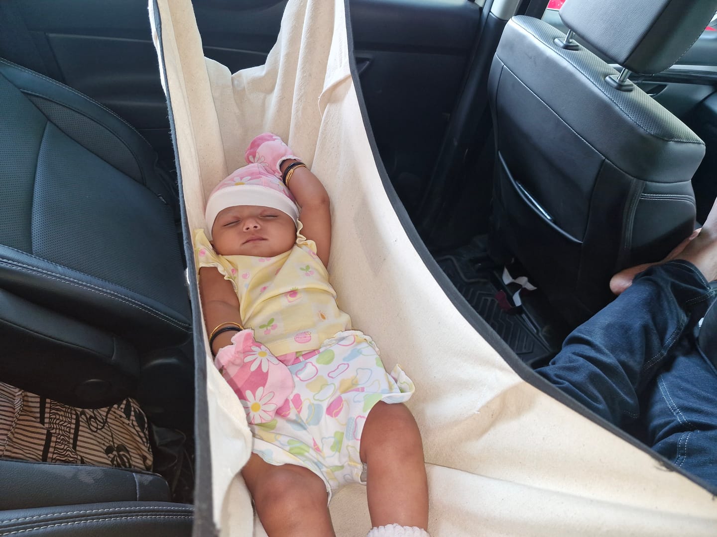 Customer photo review of CarNap - Portable Car Hammock for 0 to 3 year baby | with Adjustable Belt, Hammock Cloth, Hangers and Carry Bag | use at Car, Train, Home