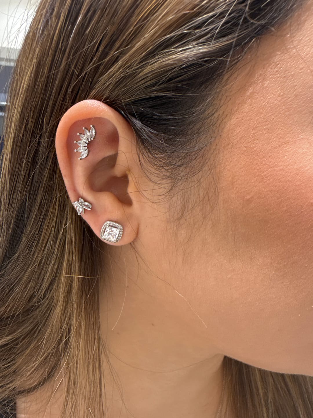 Customer photo review of Acero Quirúrgico Dorado Con Zirconias Primera Perforación