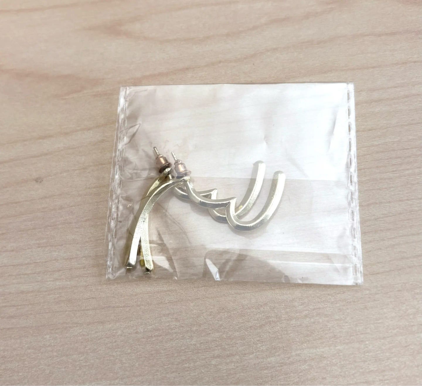 Customer photo review of Gold-Tone Earrings Open-Heart Charm With Minimalist Silhouette — Gold | KIMLUD