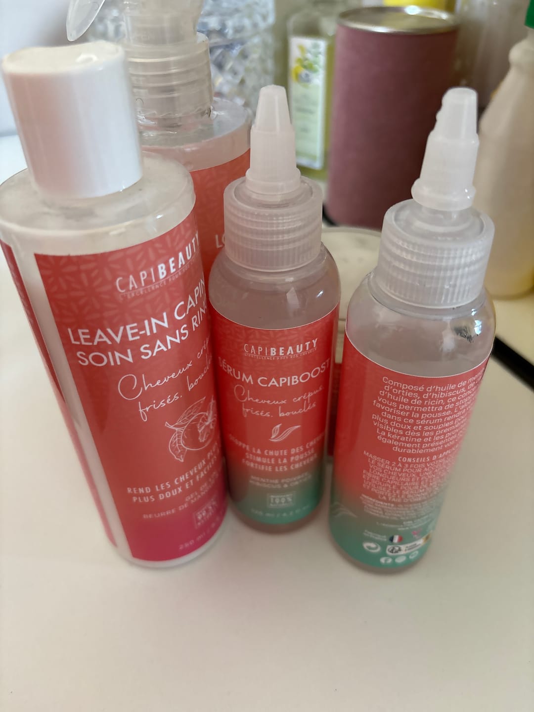 Customer photo review of Sérum Capiboost Hibiscus & Orties 120ml pour la pousse des cheveux bouclés frisés crépus