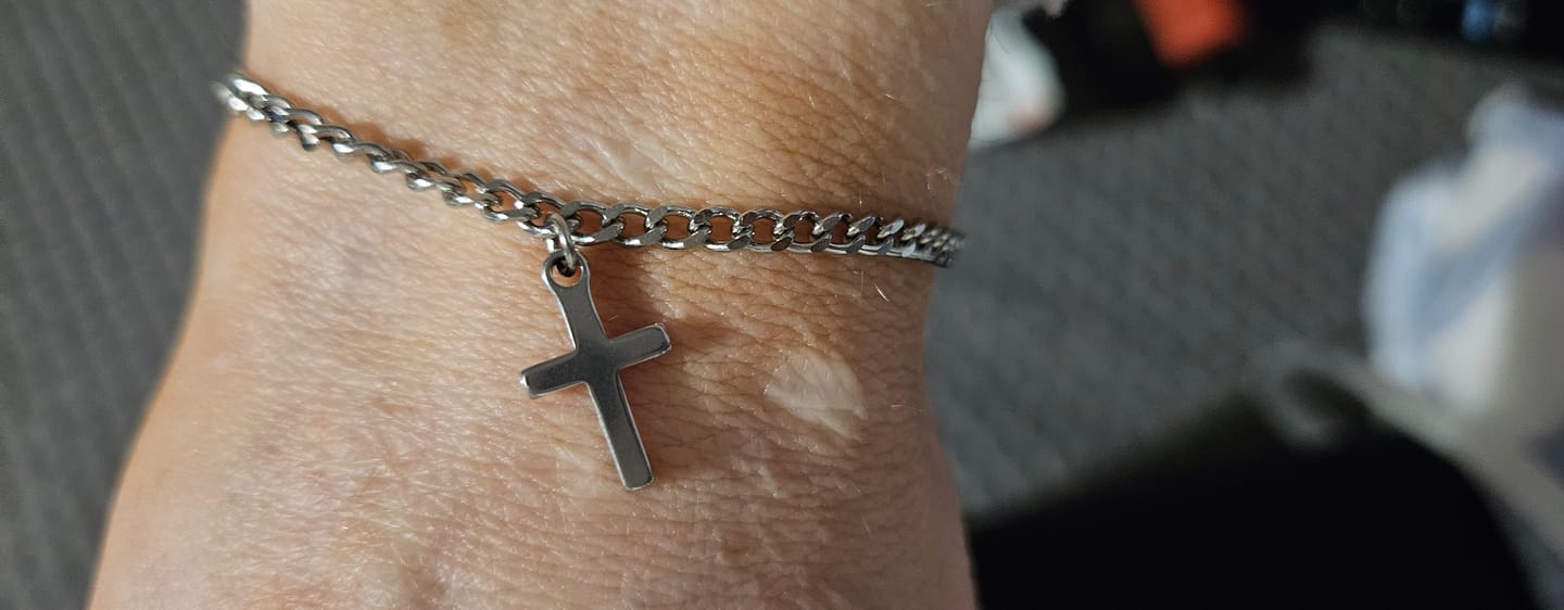 Customer photo review of Permanent Bracelet Cross Charm