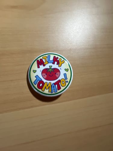 Customer photo review of Milky Tomato Logo Buttons