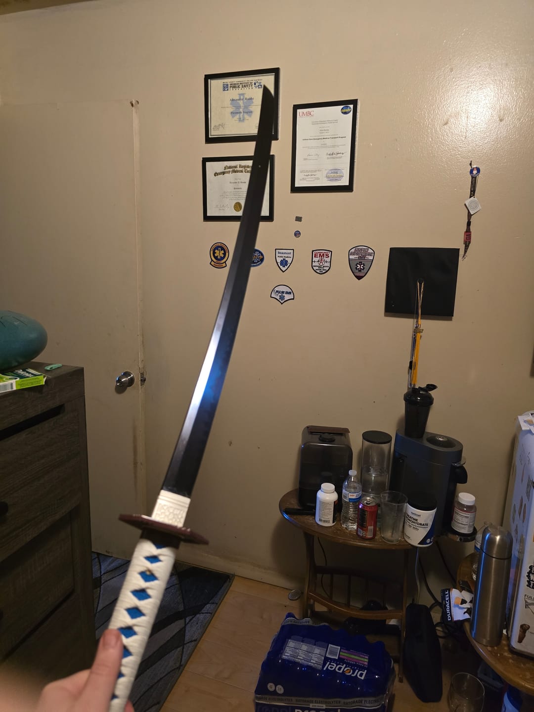 Customer photo review of The Giyuu Tomioka Handmade Katana Clay Tempered T10 Steel From Demon Slayer