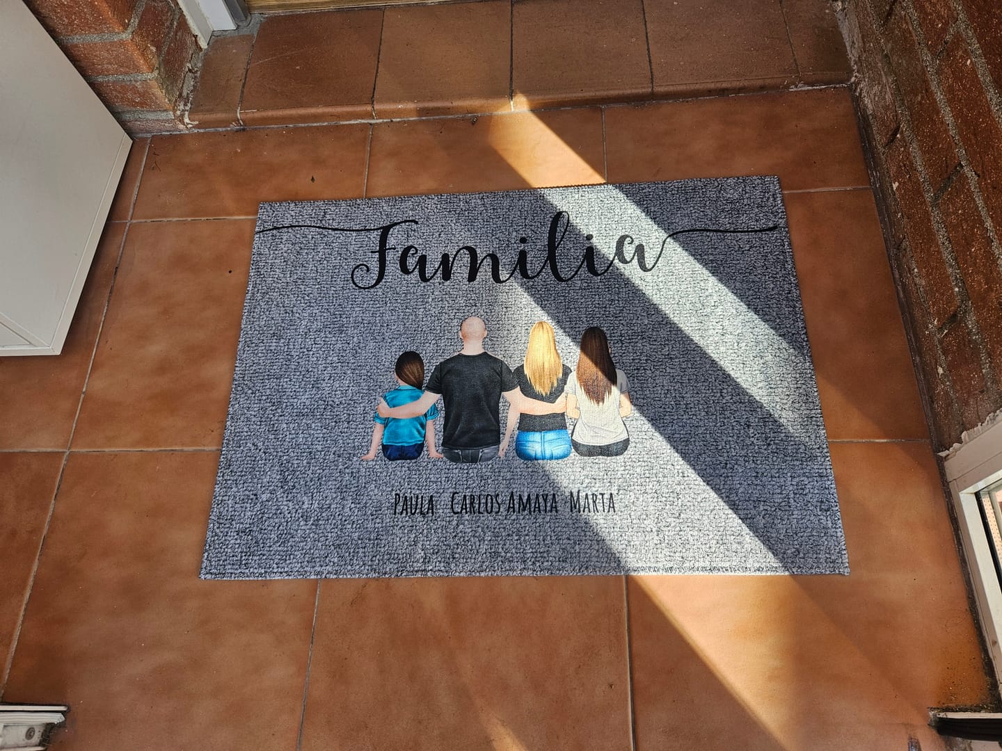 Customer photo review of Familia - Felpudo personalizado