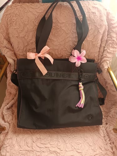 Reseña con foto de un cliente sobre Cartera De Hombro Notebook Nylon Llavero