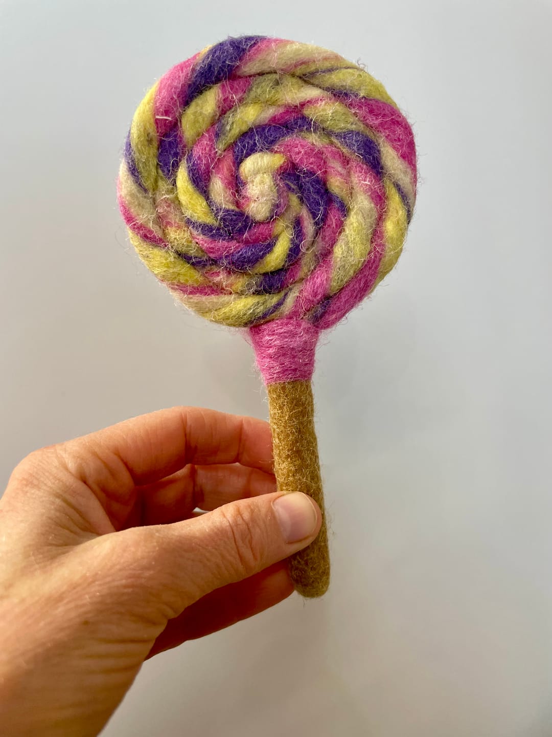 Customer photo review of Felt Colourful Purple, Pink and Yellow Swirls Lollipop
