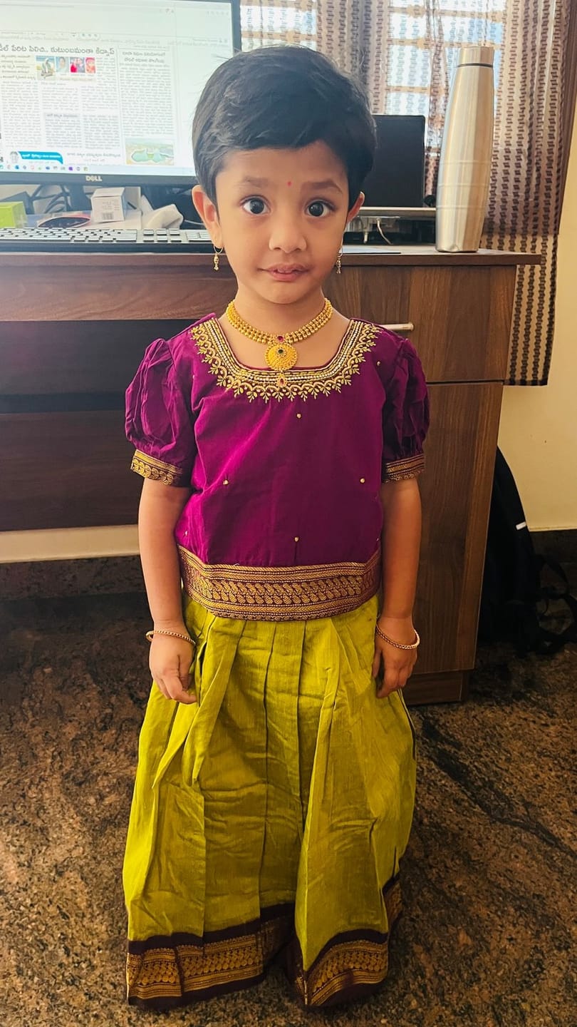 Customer photo review of Green and wine traditional langa blouse embroidered zari border dress for baby girl (100% Pure Cotton)