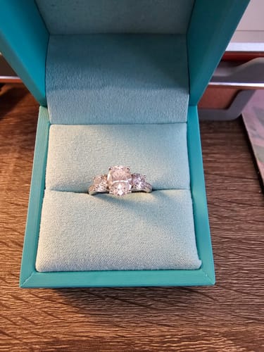 Customer photo review of Three Stone Oval Moissanite Channel-Set Engagement Ring