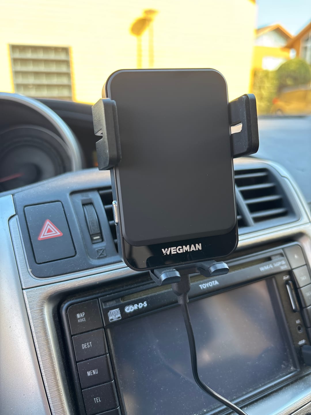 Customer photo review of WEGMAN™ Telefoonhouder met QI Draadloze Oplader Auto 15W