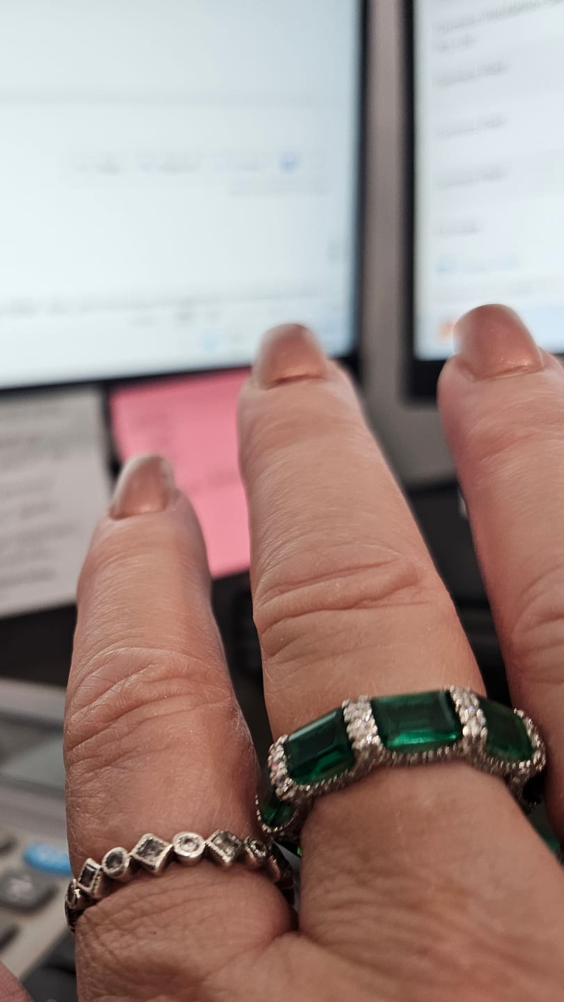 Customer photo review of Lab Created Emerald Eternity Sterling Silver Wedding Band Ring