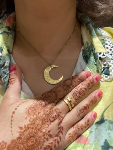 Customer photo review of Hardship & Ease Crescent Necklace