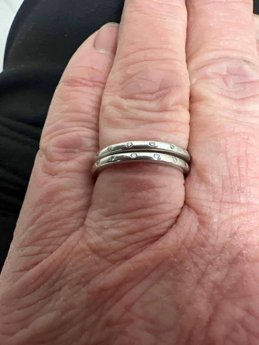 Customer photo review of Flush Set Moissanite Evenly Spaced Eternity Wedding Band