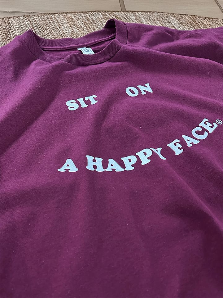 Customer photo review of Sit On A Happy Face - Graphic Tee