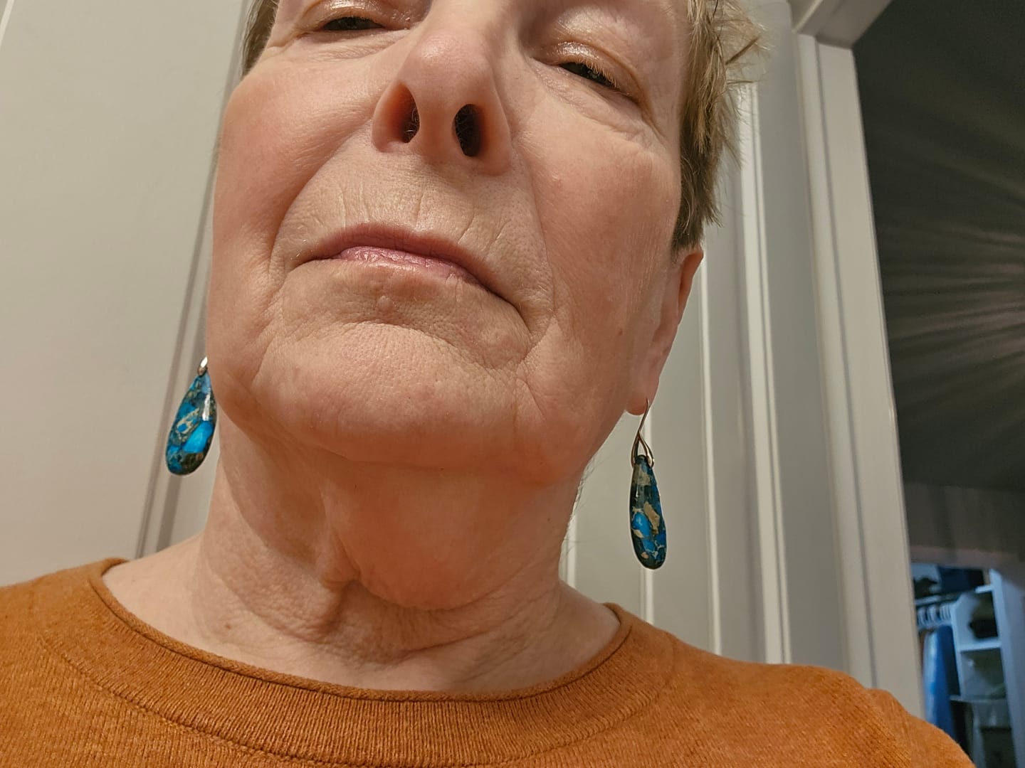 Customer photo review of Ocean Energy Protection Teardrop Earrings