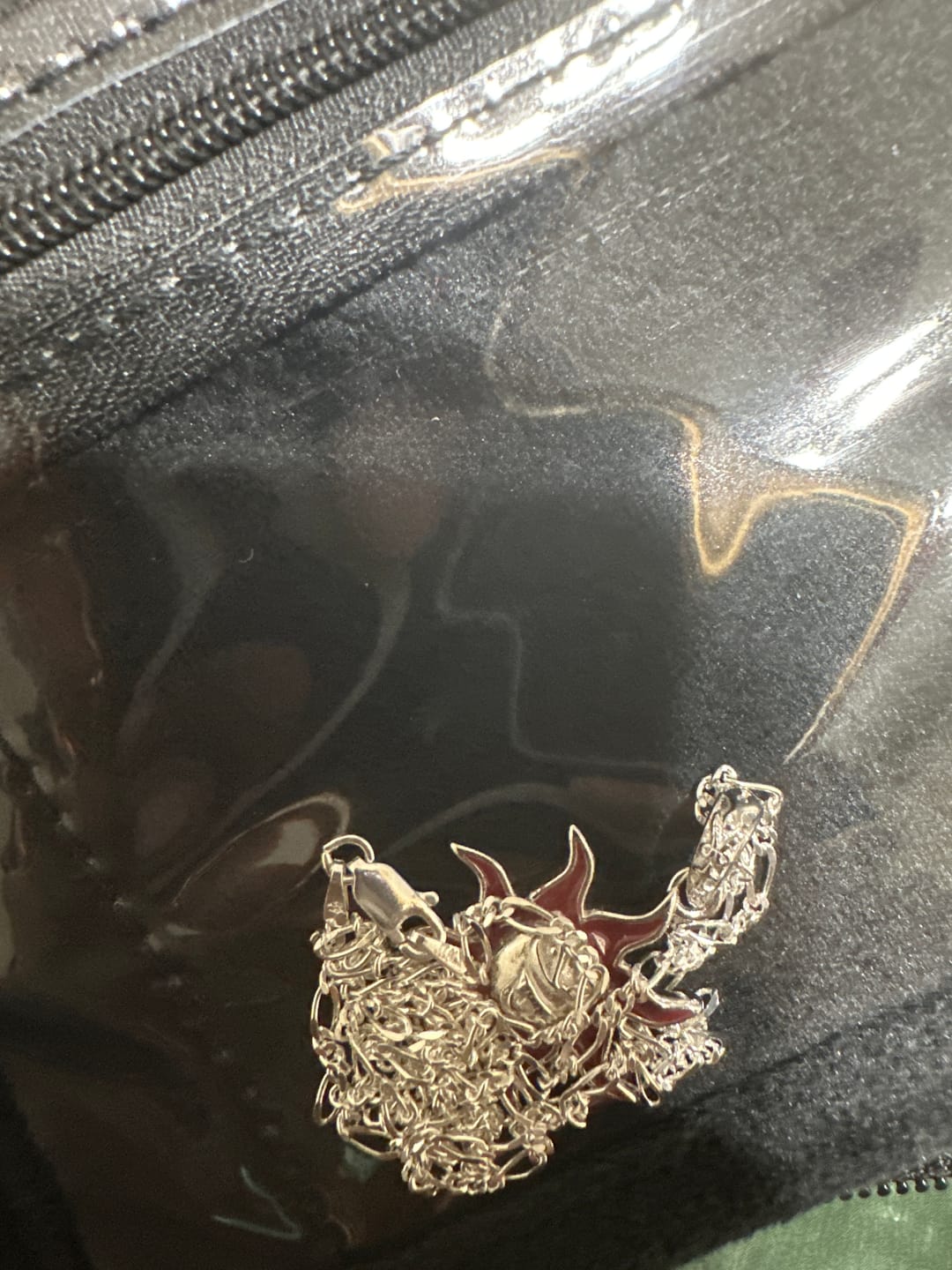Customer photo review of SUNNY THE SOMBER SUN PENDANT