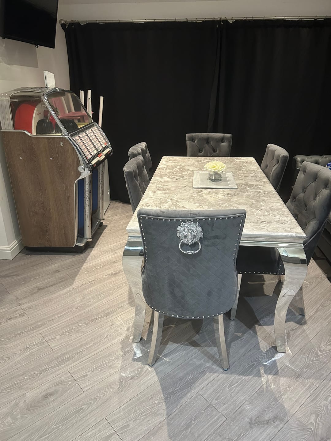 Customer photo review of Vienna Marble Dining Table With Bently Knocker Chairs lion