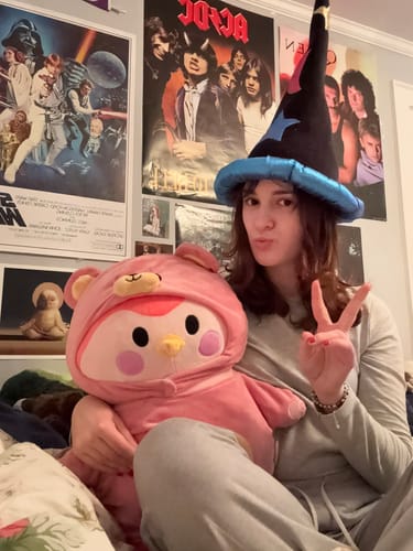 Customer photo review of Black Finch Plushie with Removable White Bear Costume