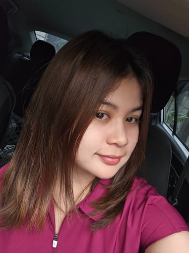 Customer photo review of Zip-Up Polo MoveTech® Scrub Top - Women / Garnet