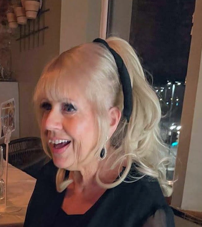 Customer photo review of Stranded Medium Flicky Clip-on Ponytail #1001 Polar Star