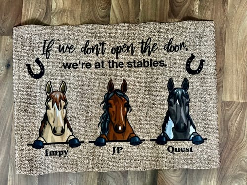 Customer photo review of Peeking horses - Personalised Doormat
