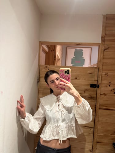 Customer photo review of Blusa Cuello Bebé Estampada White