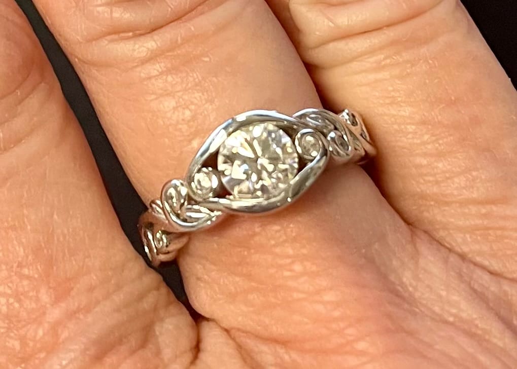 Customer photo review of Bezel Set Round Moissanite Scroll Accents Engagement Ring