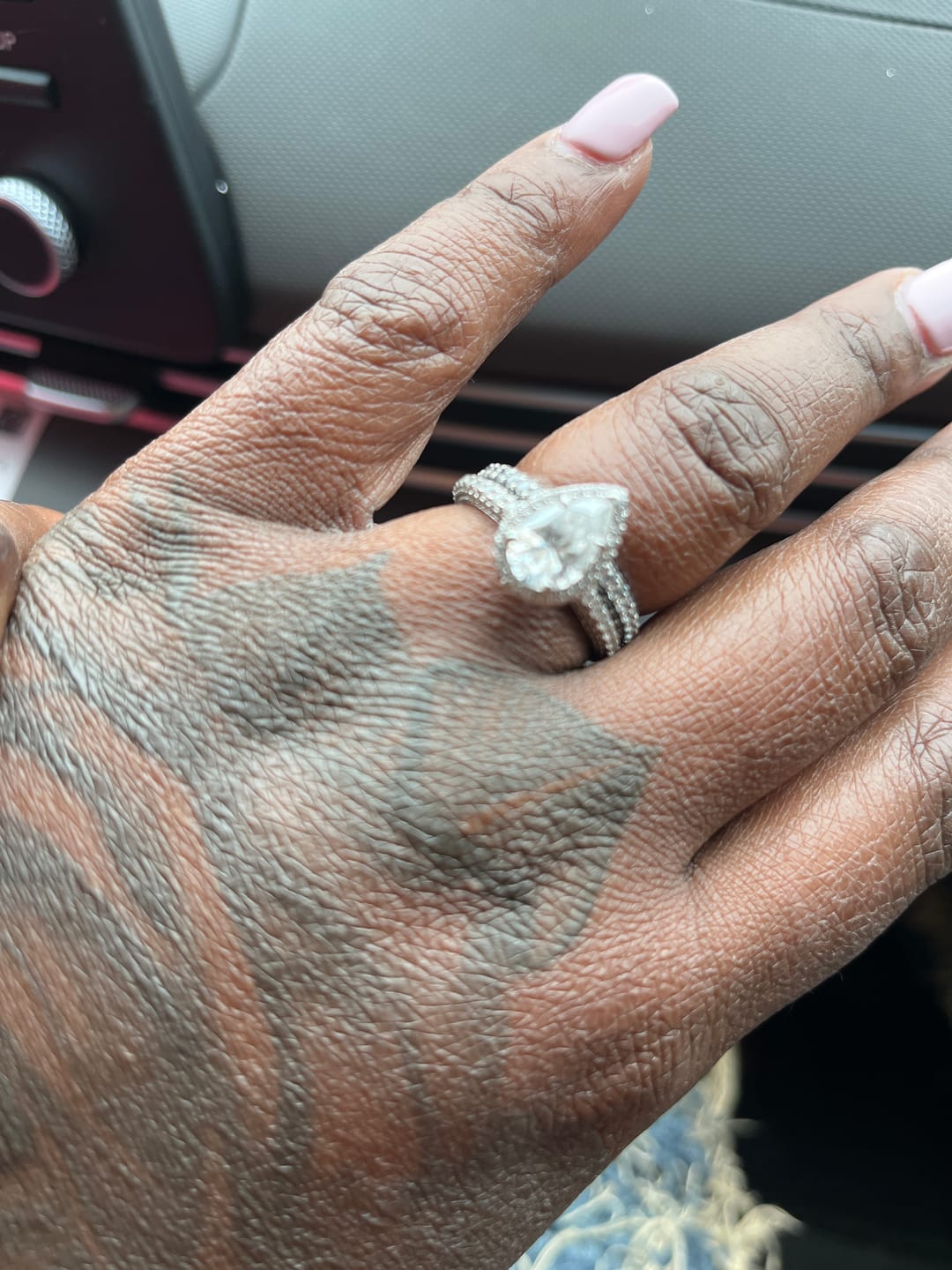Customer photo review of Halo Pear Moissanite Triple Row Pave Engagement Ring