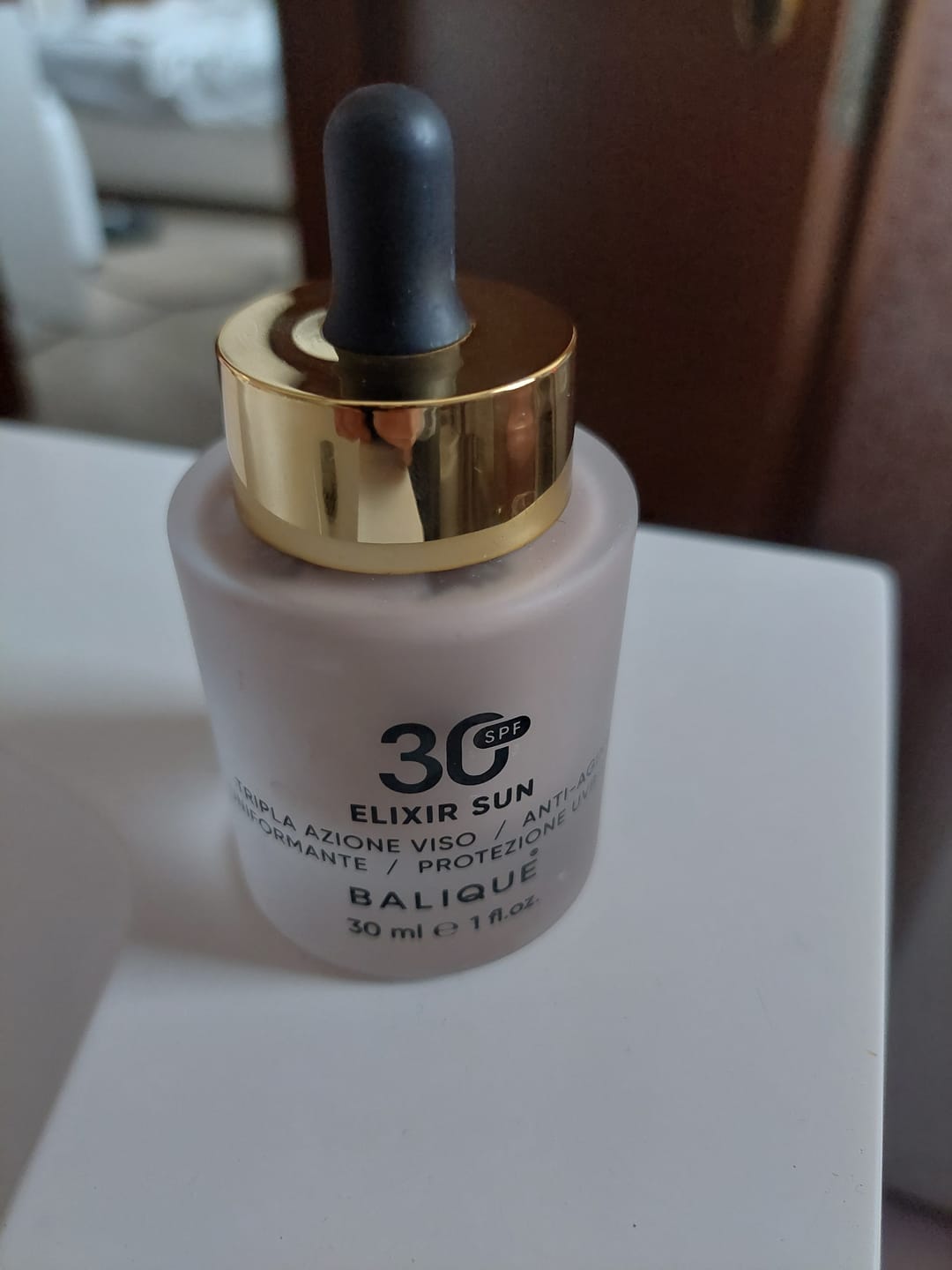 Customer photo review of ELIXIR SUN SPF30 - Siero Viso tripla azione
