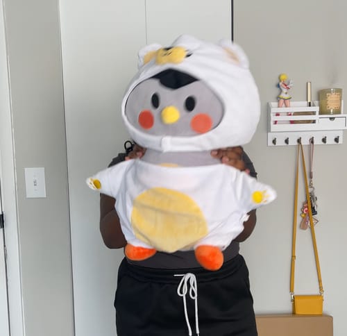 Customer photo review of Black Finch Plushie with Removable White Bear Costume