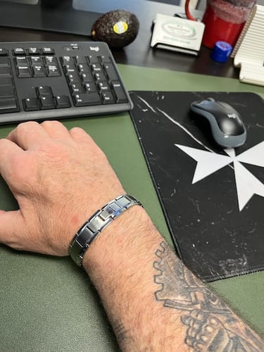 Customer photo review of Iron Man Armor Titanium Magnetic Bracelet: Helps Pair Veterans With A Service Dog Or Shelter Dog