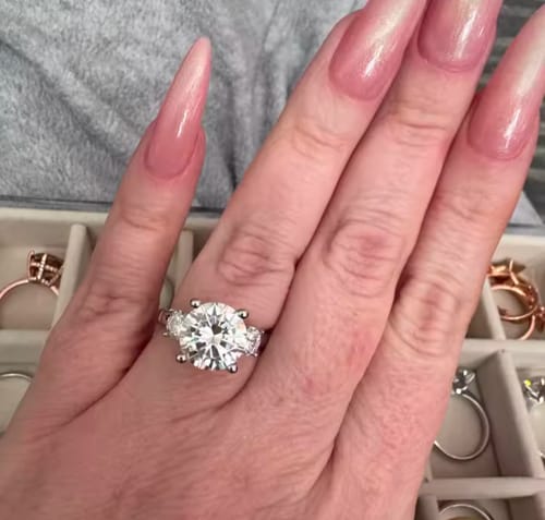 Customer photo review of Brillia Three-Stone 9.6 CT Moissanite Ring Gold Plated Silver