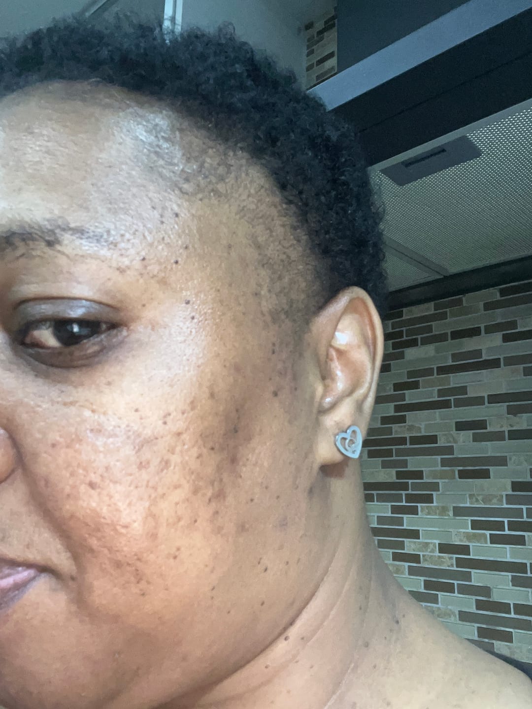 Customer photo review of Silver Thando Studs