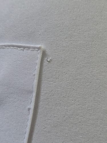 Customer photo review of 3-Pocket MoveTech® Scrub Top - Men / Industrial White