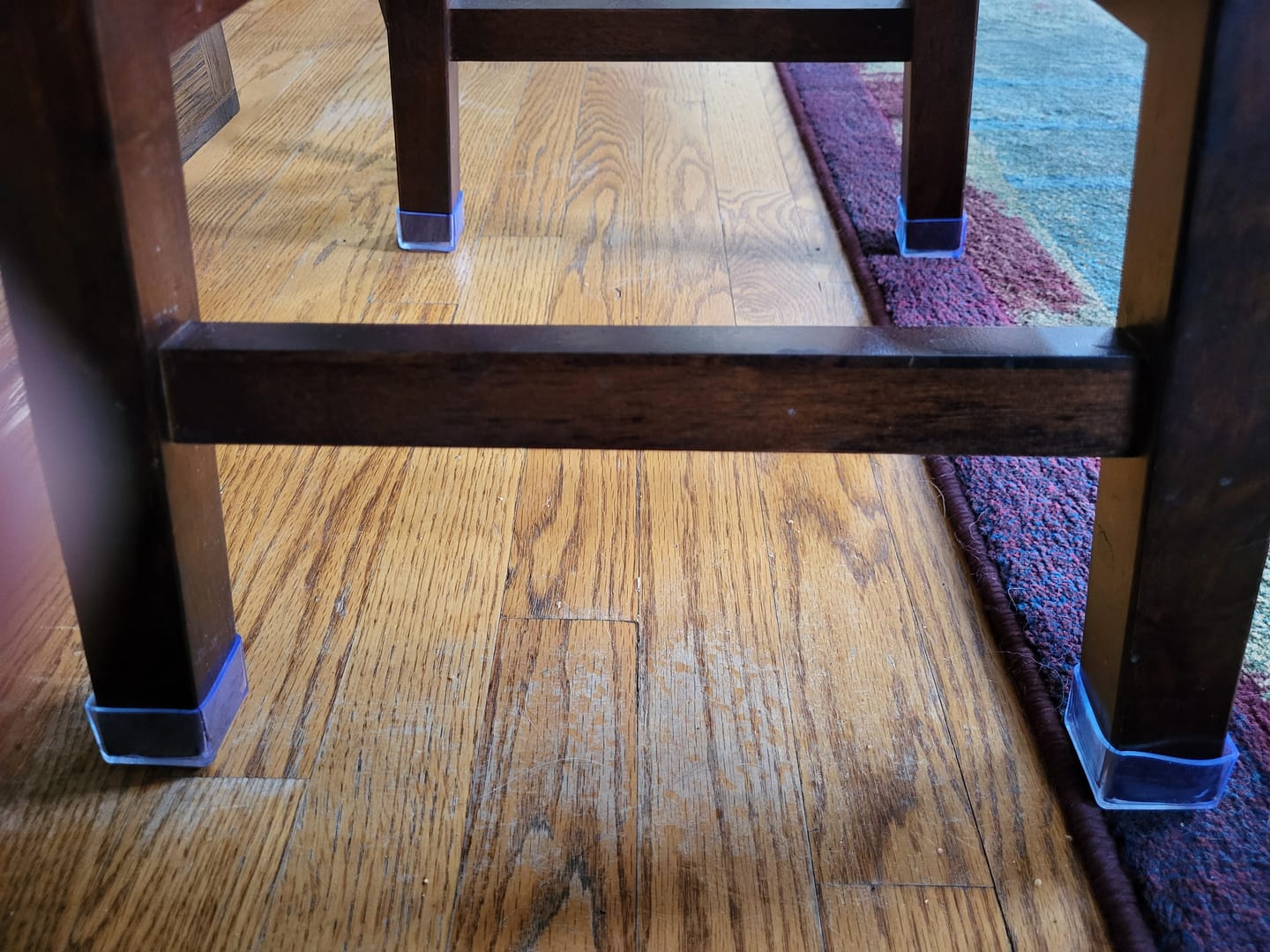 Customer photo review of Square Felt Silicone Chair Leg Protectors | Scratch & Noise-Free