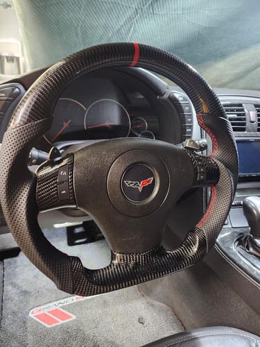 Customer photo review of Genuine Carbon Fiber Steering Wheel With Button Trim For C6 Corvette 2006-2011