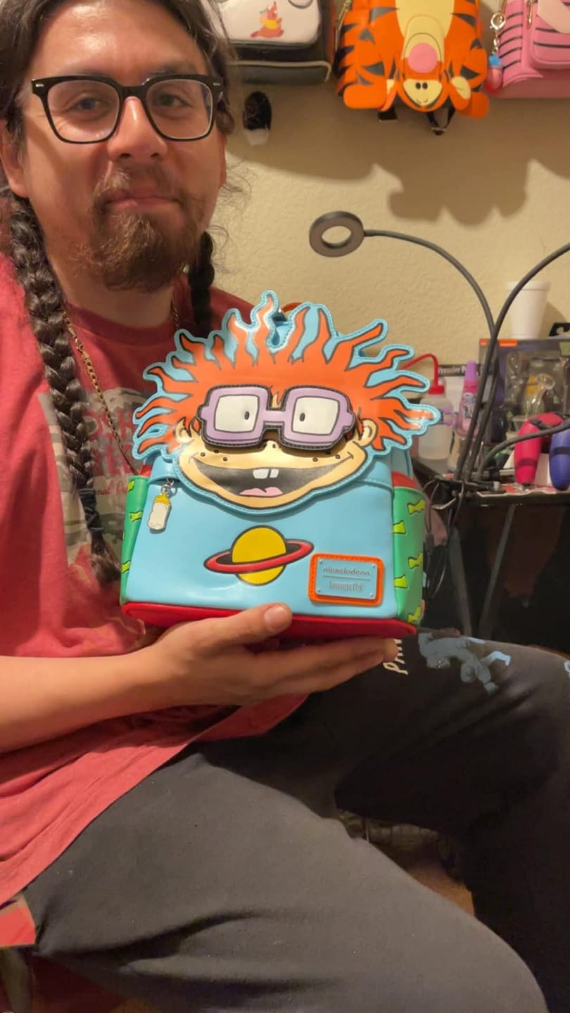 Customer photo review of Loungefly Nickelodeon Rugrats Chuckie Cosplay Mini Backpack With Removable Glasses - 707 Street Exclusive