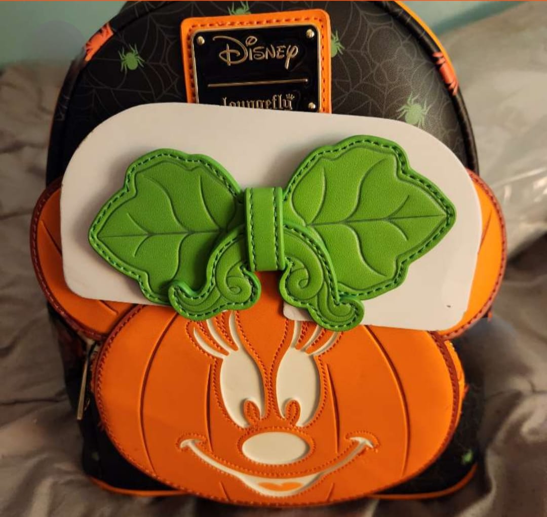 Customer photo review of Loungefly Disney Glow in the Dark Pumpkin Minnie Mouse Mini Backpack - 707 Street Exclusive