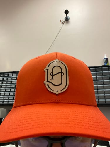 Customer photo review of Custom Leather Patch Trucker Hat - Richardson 112